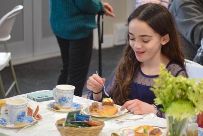 Gianna Tufano, age 11, enjoys some carrot cake.