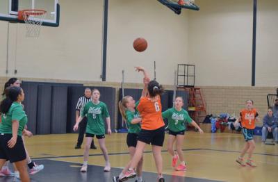Evelyn Vasconcellos shoots the ball. 