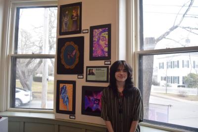 Kai Dixon with his art.