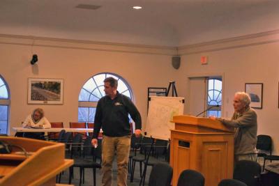 The developers for the Faunce Corner offices present their plans. Photo by Kat Sheridan