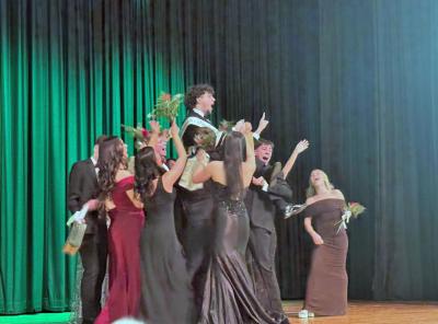 The cast lifts Gabriel Fernandes up after he wins Dartmouth's Finest.