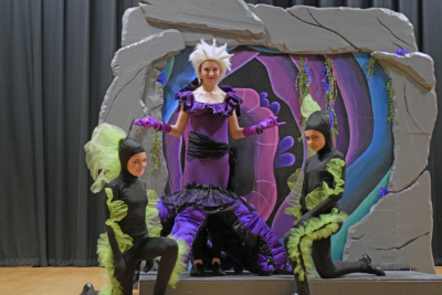 Ursula (Lauren Rose-Wells) with her eels Flotsam and Jetsam (Gracie Rezendes and Isabella Silva)