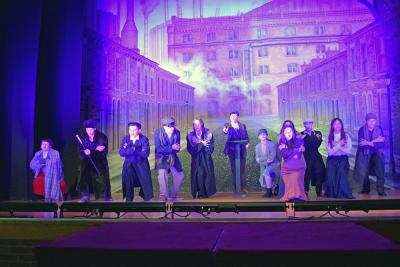 The cast sings about their displeasure of the Communist times they llive in. 