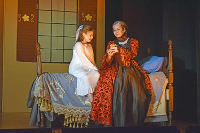 A young Anastasia talks with her grandmother (Chloe Costa.)