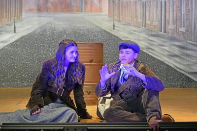 Anya (Emerson Palumbo) and Dimirtry (Jack Nylin) relive their history surviving on the streets of Russia. 