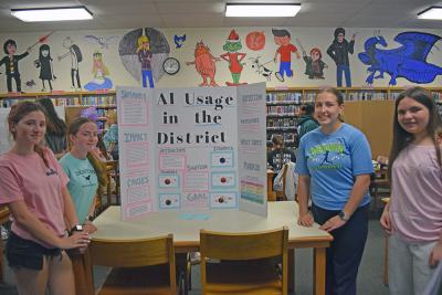 Mia Furtado, Addison LaBelle, Reese Rymszewicz and Bella Valente did their project on AI usage in school. 