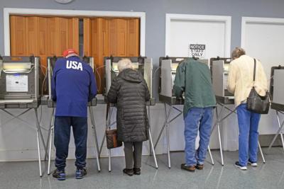 Voters at the Council on Aging fill out their ballots.  Photos by Kat Sheridan
