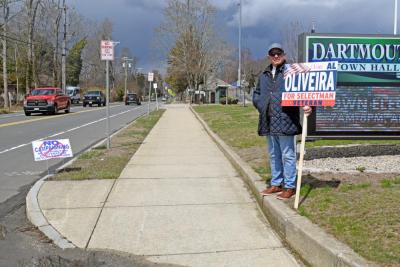 Al Oliveira campaigns outside Town Hall. 