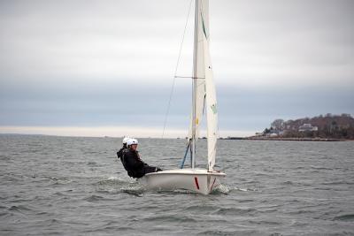 Sam Sperry and Lucas Prout lean to even the boat. 