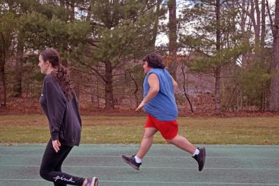 Selena Pacheco and Joe Adao finish their run. 