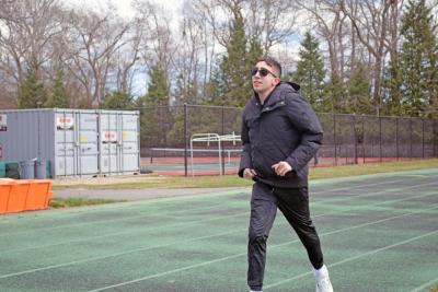 Andrew Camara runs in the 400 meter.