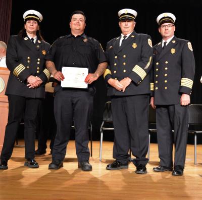 Deputy State Fire Marshal Maribel Fournier,  Firefighter Jacob Andrade,   Retired Chief Peter Andrade and Chief Timothy Lancaster. Source: Peter Andrade