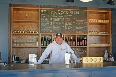 Steve Barwikoski stands at the counter of the tasting room. Photos by Kat Sheridanac
