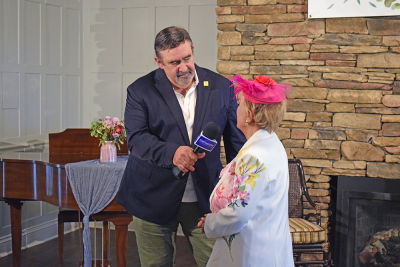Carl Alsh interviews Maria Connor during the event. 