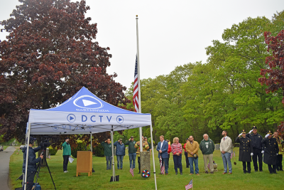 The flag is lowered in memory of the 34 veterans lost from Dartmouth. 