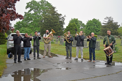 The Dartmouth Community Band performed the National Anthem. 