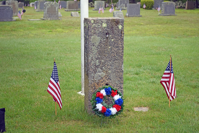 A grave decorated for Memorial Day.