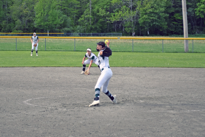 The pitcher throws a ball. 