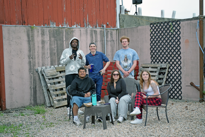 A friend groups poses. 