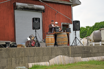 The DJ performs for the crowd. 