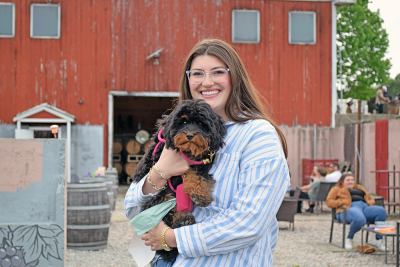Mackenzie Rubitschung with her dog. 