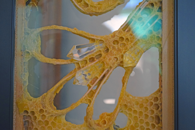 A piece where the bees built around some crystals. 