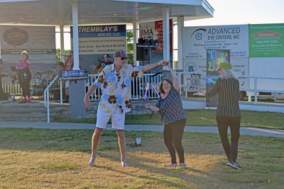 Robert Seale, Heather and Lisa Riley dance together. 