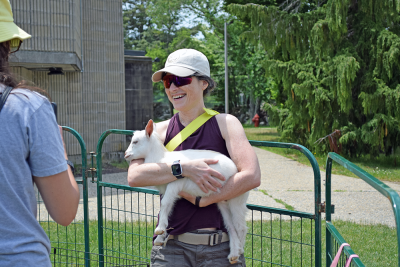 Bethany holding the baby goat. 