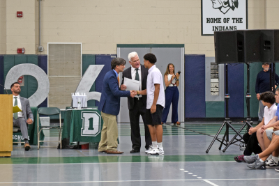 Anderson DeCruz receives the Karen Marchand Award. 