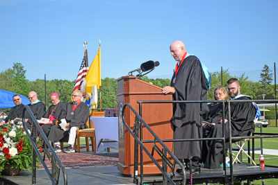 President of Bishop Stang James Benson speaks. 