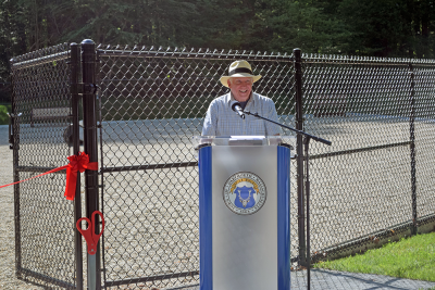 Howard Baker-Smith of the Community Preservation Committee welcomes people to the park. 