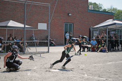 A player starts running toward base. 