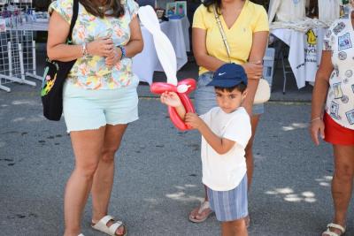 Aiden, 4, with a balloon sword. 