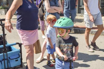 Rhys and Beckett, both 3, show off their painted faces. 