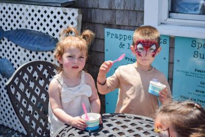 Dylan, 2, and Luka, 4, enjoy a free kiddie ice cream. 