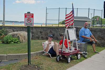 Some boys sold lemonade at Jones Beach. 