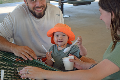 A.J. beat the heat with some ice cream. 