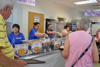 Serving up the food. More photos by Kat Sheridan