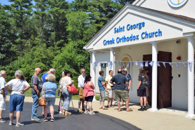 The line wrapped throughout the church and all the way outside. 