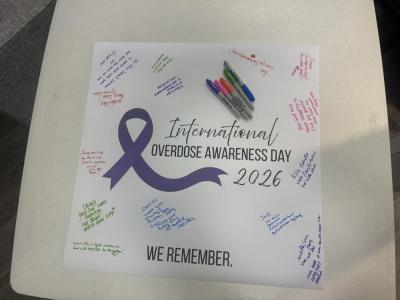 The poster with messages to loved ones. Photos by Kat Sheridan