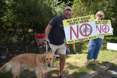 Jeff Rousseau protested with his dog. 