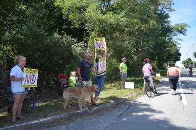 Protesters outside Running Brook Vineyard. 