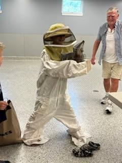 One of the kids tries on the beekeeper suit. Source: Humane Society and Shelter Southcoast Facebook