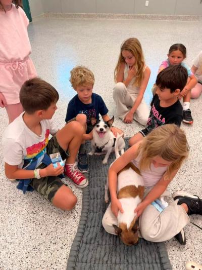 The kids meet a puppy. Source: Humane Society and Shelter Southcoast Facebook