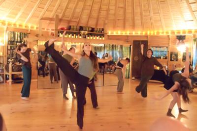 The group dances together. 