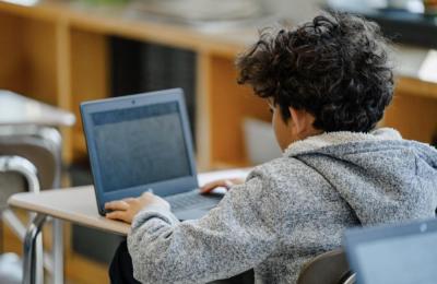 A child at their computer for the MCAS. Source: DESE