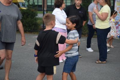 Emre, 6, and Nico, 6.5, were happy to see each other after the summer. 