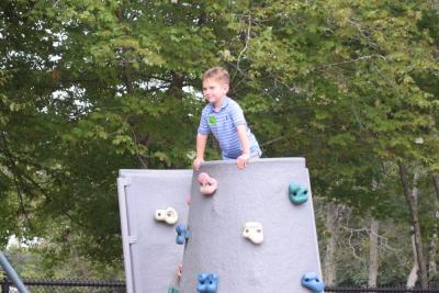 Stratton Beechinor, 5, got all the way to the top of the rock wall. 
