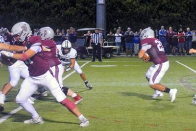 Amir Cartagena, New Bedford, runs with the ball. 