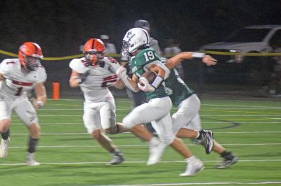 Chace Powers runs for a touchdown. 
